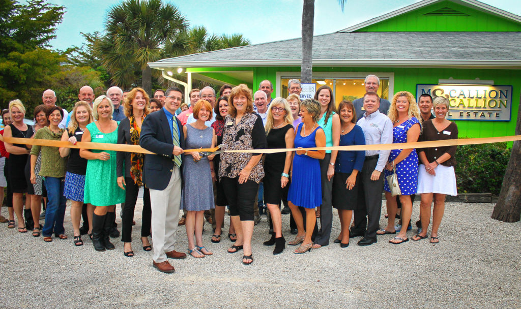 Ribbon cutting for the opening of McCallion & McCallion Real Estate